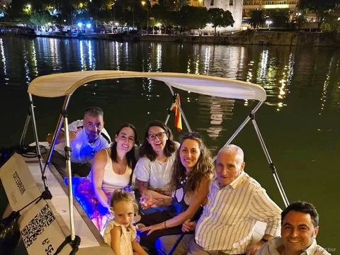 View of the Torre del Oro from the private electric boat ride in Seville